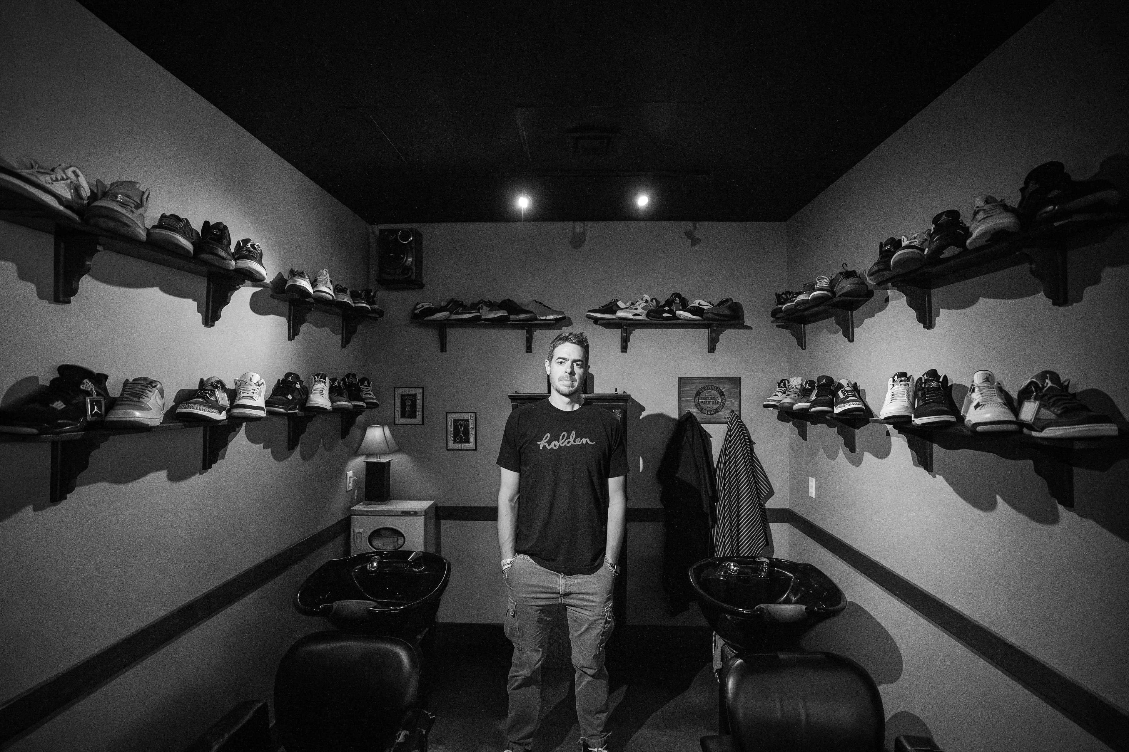 Clean Cut CDA Gallery - Haircut interior with sneaker collection
